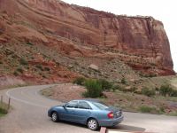 Cliff and our rental car at Balanced Rock - Colorado National Monument (Colorado, USA)