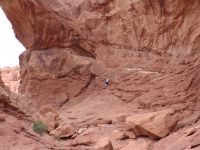 Dad climbing Double Arch for a photo - Arches National Park (Utah, USA)