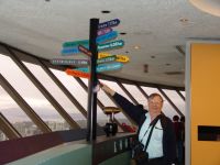 Dad with distance signs - Harbour Centre Tower (British Columbia, Canada)