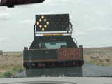 Following the pilot car on the highway to Monument Valley - Route 163 south (Utah, USA)